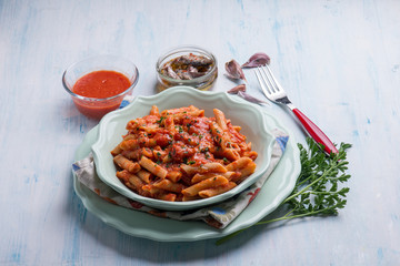 pasta with tuna  anchovyand tomatoes sauce