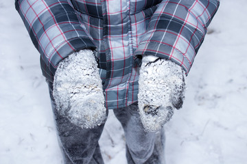 gloves covered with snow