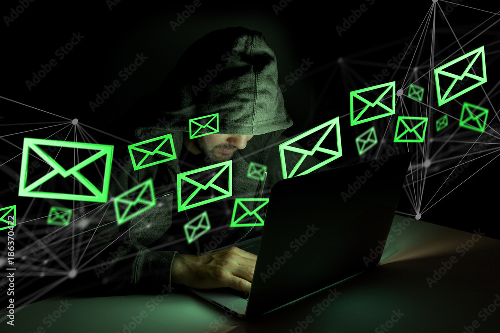 Poster hacker man in the dark using computer to hack data and information system
