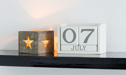 White block calendar present date 7 and month July