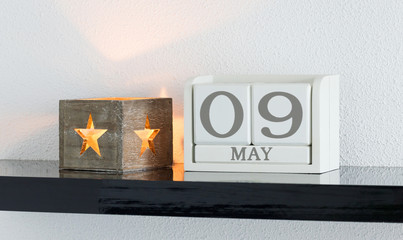 White block calendar present date 9 and month May