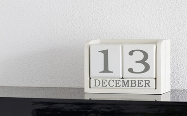 White block calendar present date 13 and month December