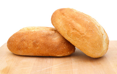 Breads isolated on wooden board on white background