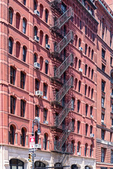 Fototapeta premium Typical old houses with facade stairs in TRibeca, NYC, USA