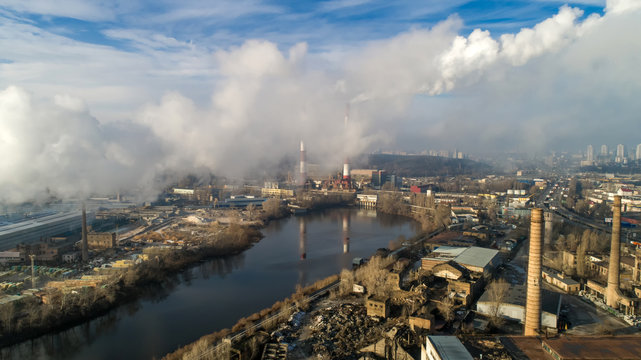 Garbage incineration plant. Waste incinerator plant with smoking smokestack. The problem of environmental pollution by factories.