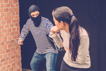 The robbers or thief along with the knife, hold the women hostage, threatening to kill her for...