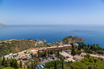 Fototapeta na wymiar Taormina, Sicily. Scenic view of the city on the shores of the Ionian Sea