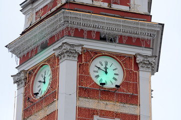 The clock on the city tower.