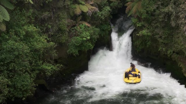 time lapse of a whitewater raft caught under tutea falls on the kaituna river, new zealand