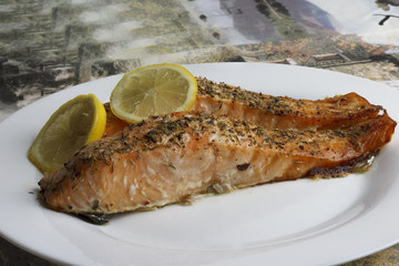 Fried salmon steaks on a plate