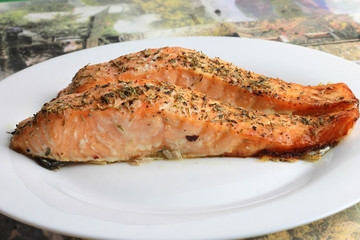 Fried salmon steaks on a plate