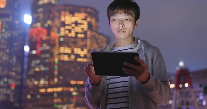 Man use of digital tablet computer