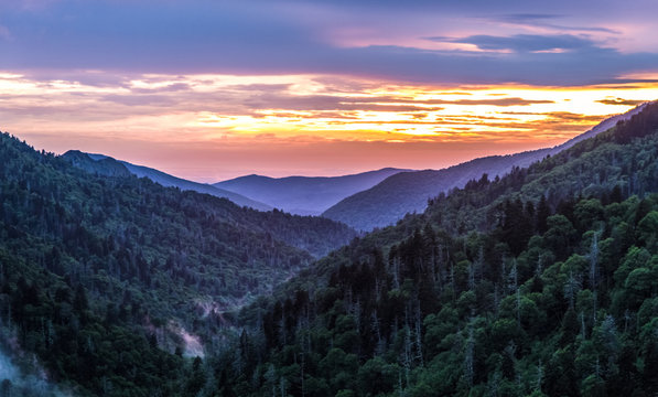 Great Smoky Mountain Sunset Background. Great Smoky Mountain sunset panorama over the many layers and ridges of the beautiful Appalachian Mountains of Tennessee.