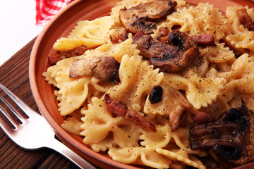 Italian pasta with fugi, farfalle fresh vegetables - cuisine