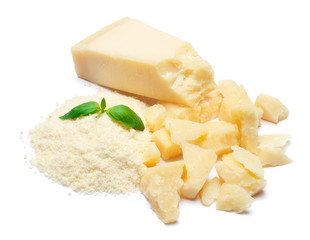 a piece of Parmesan and grated cheese on white background