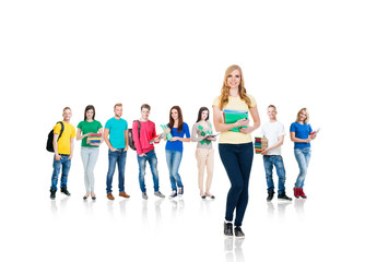 Obraz premium Large group of teenage students isolated on white background. Many different people standing together. School, education, college, university concept.