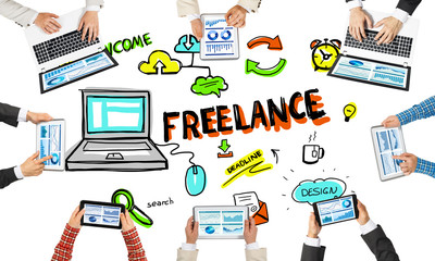 Top view of businesspeople sitting at table and using gadgets