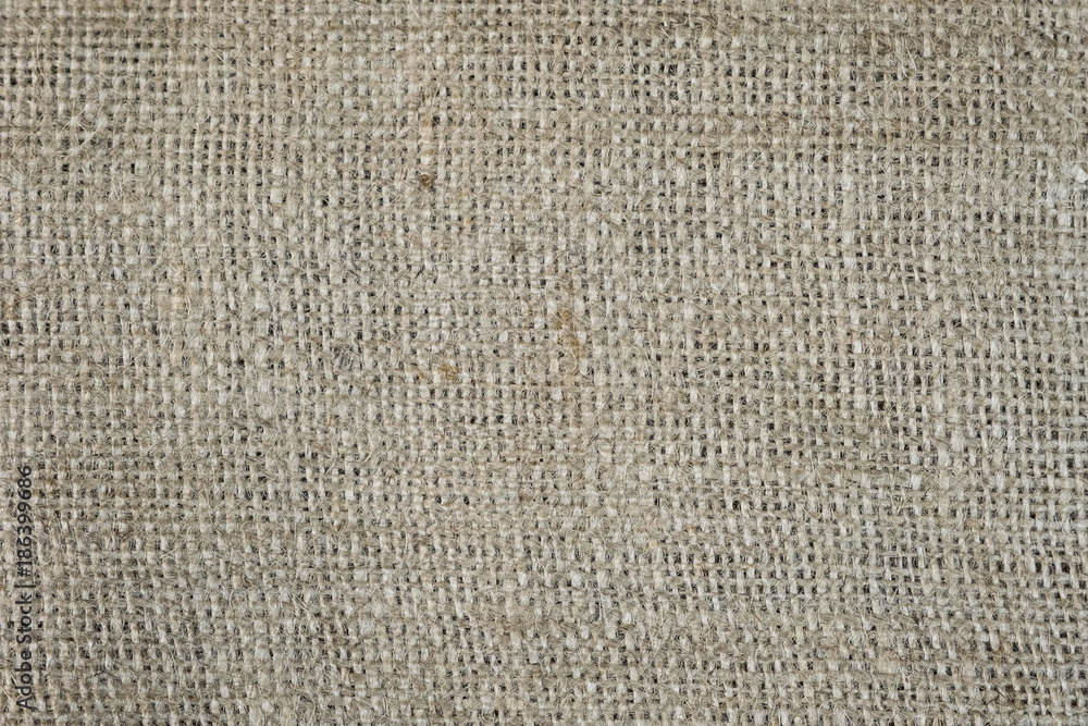 Wall mural Jute hessian sack bag fabric texture background. High detailed.