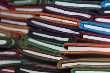 Group of notebooks with cover of typical designs made by hand in Guatemala, sale as souvenirs for tourists.