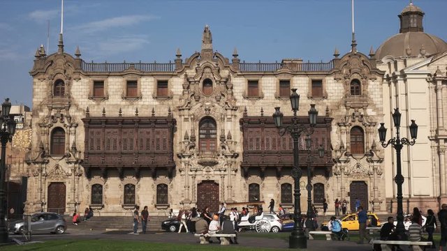 wide view of the exterior of the archbishop's palace at the plaza mayor in lima, peru