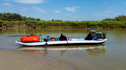 Kayak ashore equipped for touring