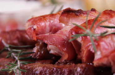 Chicken meat wrapped in bacon