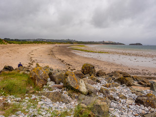 Rocks and coastline at Tenby South Beach, Tenby, Wales, Uk