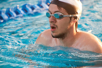 Man on swimming training