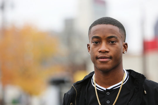 Cityscape portrait of a young African American male model.