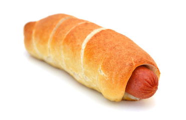 Sausage in bread isolated on white background