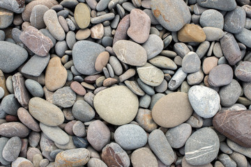 Beach stones background. Top view