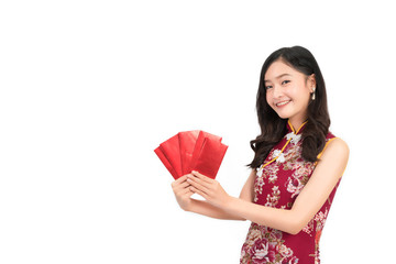 Asian woman wearing chinese dress hold Red envelopes or cheongsam,qipao smile in chinese new year on white isolated background