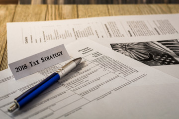 Obraz premium Tax reform 2018 planning concept with tax preparation forms 
