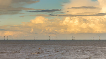 Clouds over wind turbines in the North Sea, seen from Whitstable, Kent, England, UK