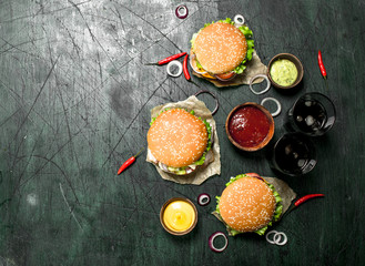Fast food. Fresh burgers with cola.