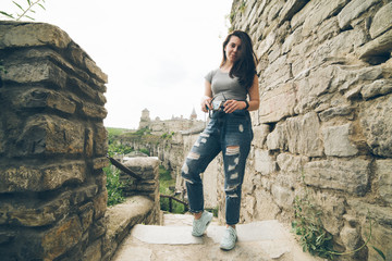 yang pretty woman tourist in front of castle