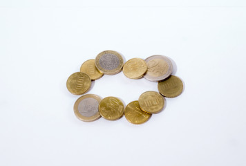 Kleingeld, Euromünzen im Kreis gelegt