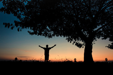 Man standing silhouette praying  / Inspirational ideas