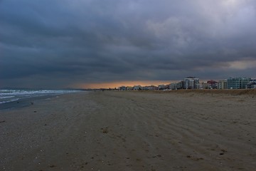 Italy, Romagna: Rimini beach in winter.