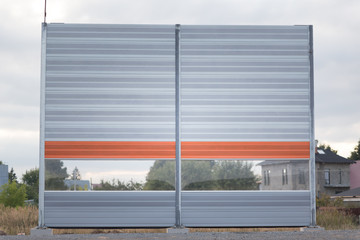One section of a acoustical barrier or a sound wall. Reducing of noise and sound pollution made by...