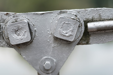 Metal construction of the bridge. Details are fastened with bolts and nuts