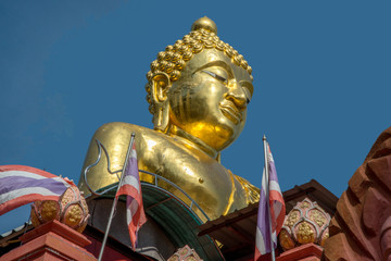 Gold Buddha statue near the Golden Triangle in northern Thailand