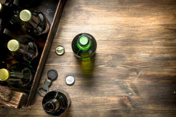 box of fresh beer. On wooden table.