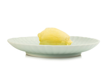 Naklejka na ściany i meble durian. king fruit. peeled. on dish. isolated on white background