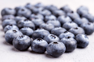 Close Up of Fresh and Tasty Blueberries on Background