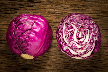 cabbage purple on wooden. kitchen. morning. slice. half