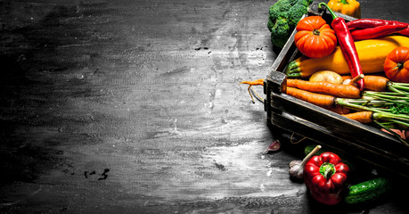 Organic food. Fresh vegetables in an old box.