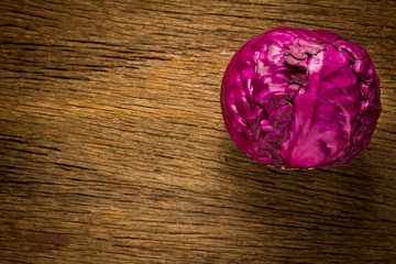 cabbage purple on wooden. kitchen. morning. top view