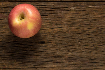 apple on old wooden. morning