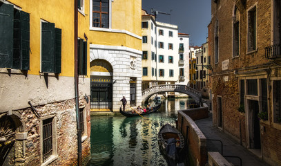 Walking along the canals of Venice.